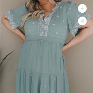Light teal embroidered dress with scalloped edges